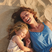 Mother & daughter on beach